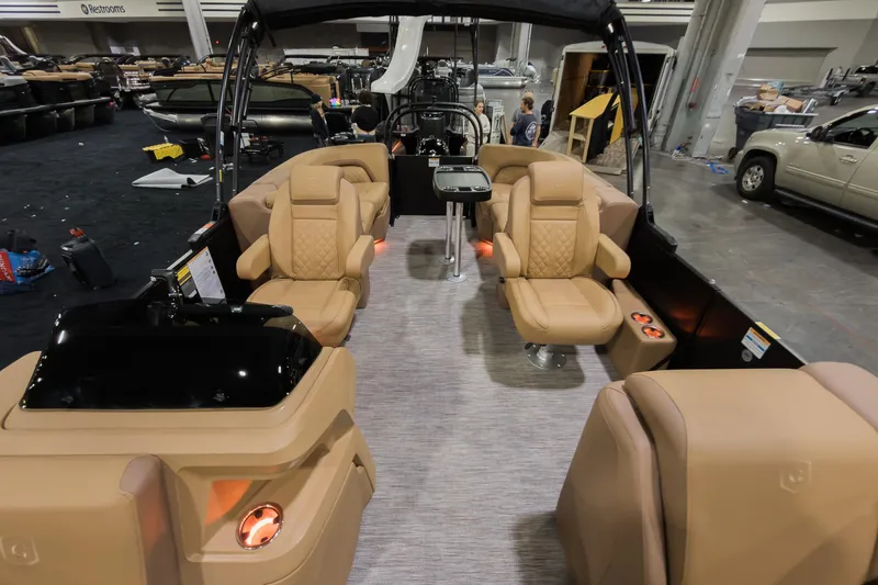 Slide: The Image of 2026 Godfrey Sweetwater 22' Split Bench Tritoon interior with luxurious seating and modern design. - 7