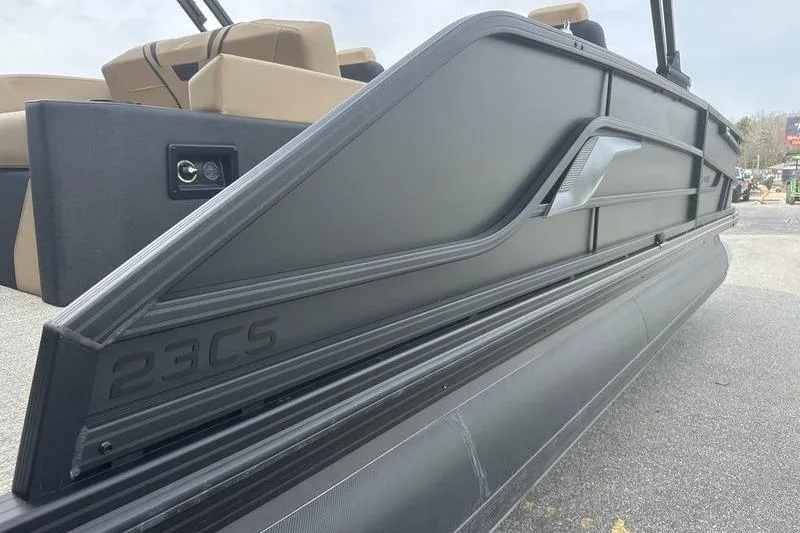 Slide: The Image of 2026 Evotti 723CS boat side view, featuring sleek black design and modern seating. - 10