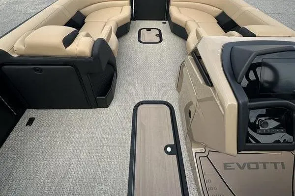 Slide: The Image of Luxurious interior of 2026 Evotti 723CS boat with beige seating and modern dashboard. - 12