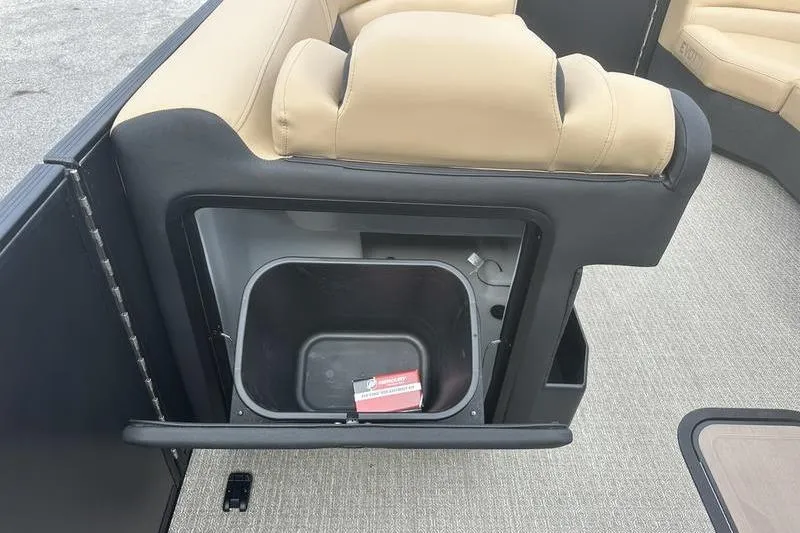 Slide: The Image of Evotti 723CS 2026 boat interior with beige seating and built-in storage compartment. - 20