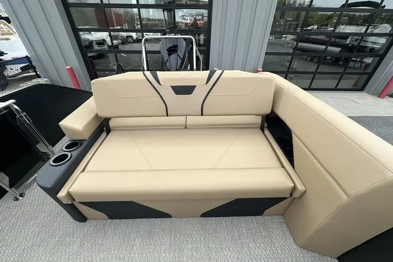 Slide: The Image of Luxurious beige seating on 2026 Evotti 723CS boat, featuring cup holders and modern design. - 21