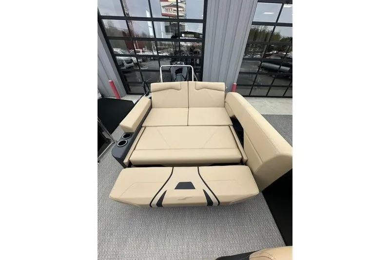 Slide: The Image of Luxurious beige seating in Evotti 723CS, 2026 model, with cup holders and modern design. - 22