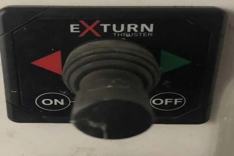 Slide: The Image of Exturn thruster control panel on 1997 Bayliner 3988 Motoryacht, featuring on/off switch. - 23
