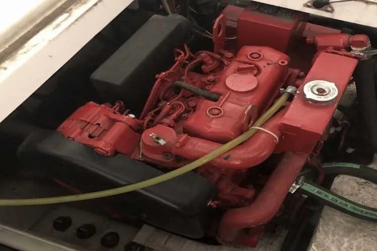 Slide: The Image of Engine of 1997 Bayliner 3988 Motoryacht, red components, detailed view. - 25