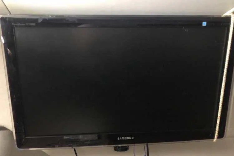 Slide: The Image of Samsung TV mounted on a 1997 Bayliner 3988 Motoryacht interior wall. - 36