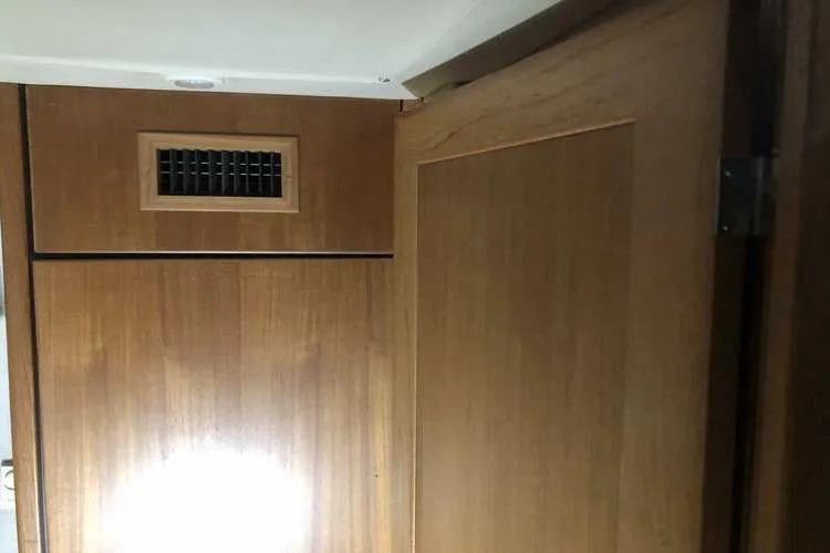 Slide: The Image of Interior wood paneling of 1997 Bayliner 3988 Motoryacht with vent detail. - 42
