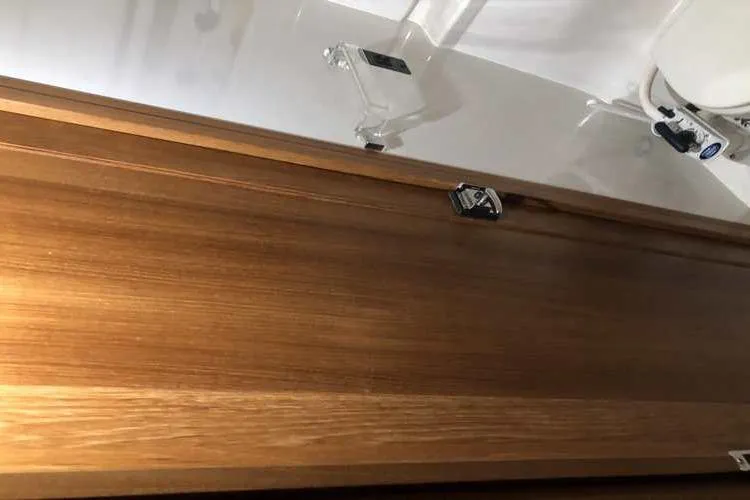 Slide: The Image of 1997 Bayliner 3988 Motoryacht interior with wooden cabinetry and modern fixtures. - 51