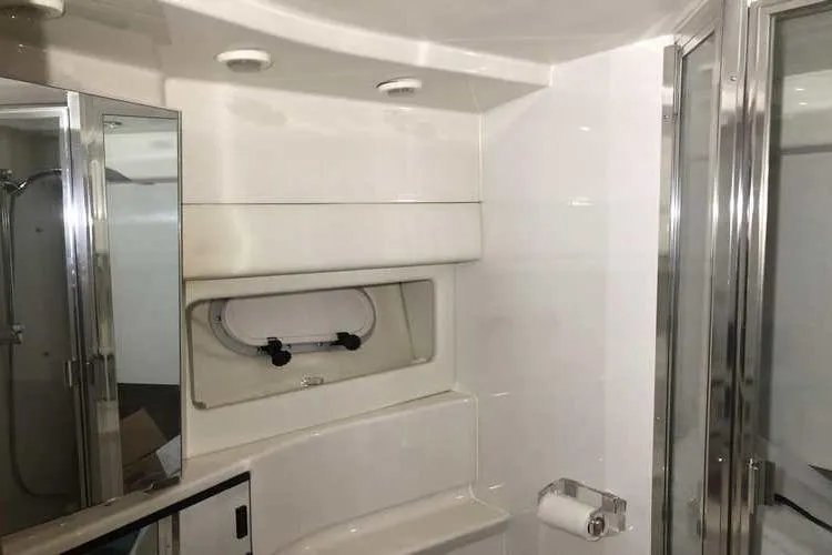 Slide: The Image of 1997 Bayliner 3988 Motoryacht bathroom with modern fixtures and sleek design. - 58