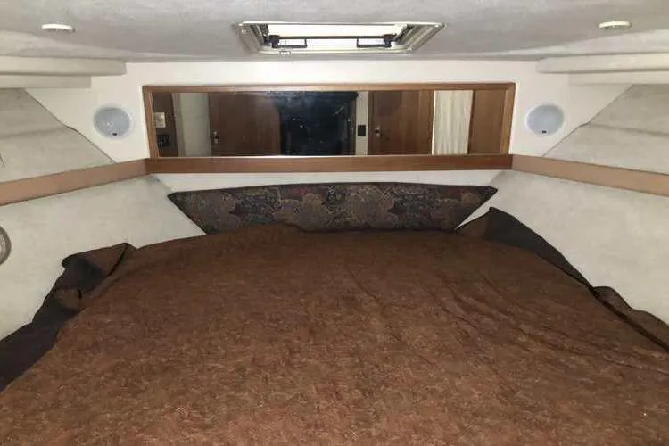 Slide: The Image of 1997 Bayliner 3988 Motoryacht interior cabin with bed and mirror. - 69