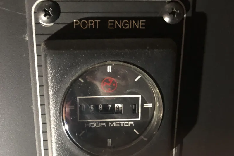 Slide: The Image of 1997 Bayliner 3988 Motoryacht port engine hour meter displaying 5879 hours. - 75