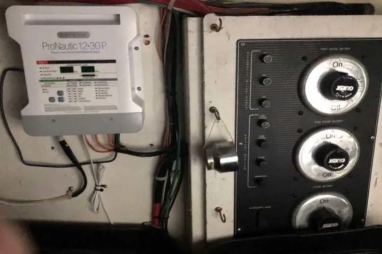 Slide: The Image of Electrical panel and ProNautic charger on 1997 Bayliner 3988 Motoryacht. - 78