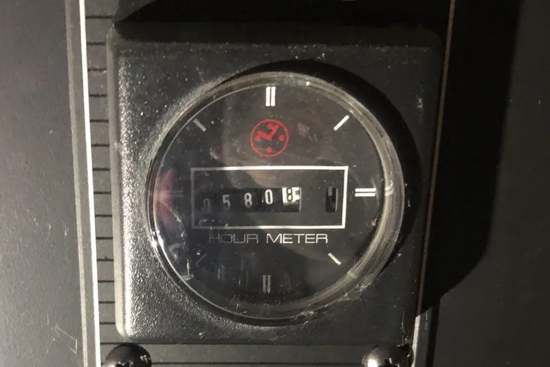 Slide: The Image of Hour meter reading 5808 on 1997 Bayliner 3988 Motoryacht dashboard. - 80
