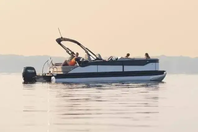 Slide: The Image of Manufacturer Provided Image: 2026 Barletta ARIA 22UC pontoon boat on calm water at sunset. - 10