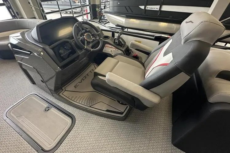 Slide: The Image of 2026 Evotti 723QL boat interior with modern helm and comfortable seating. - 13