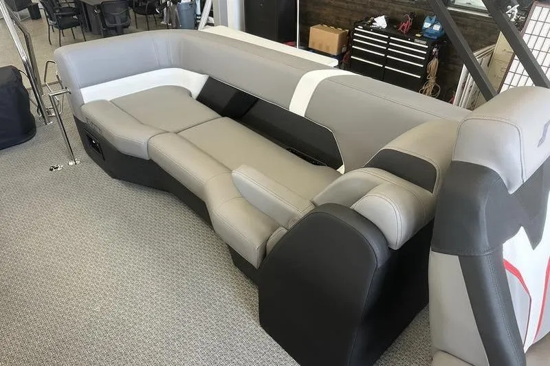 Slide: The Image of Modern Evotti 723QL boat seating, 2026 model, in showroom with gray and black upholstery. - 22
