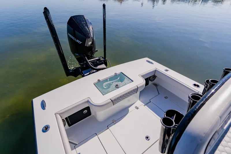 Slide: The Image of 2024 Dorado 25 boat with Mercury engine, featuring spacious deck and rod holders. - 37