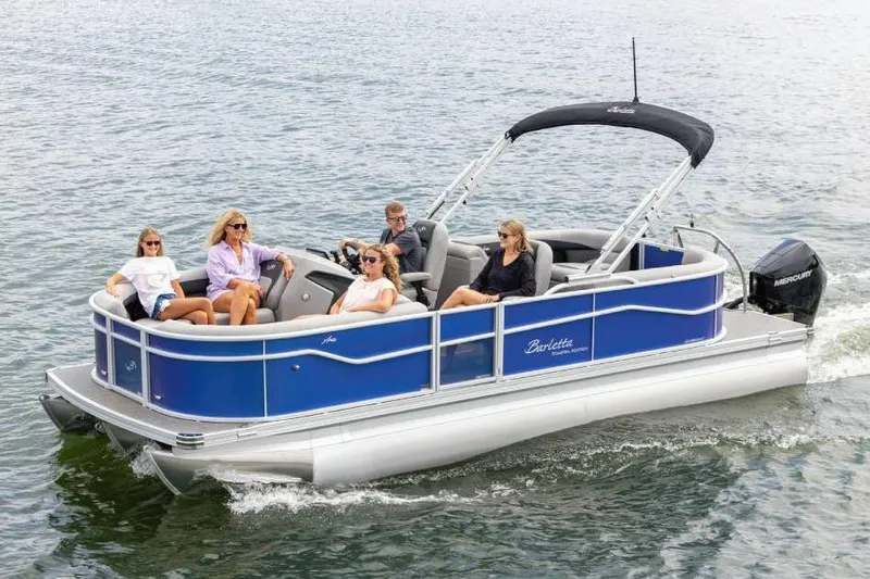 Slide: The Image of Manufacturer Provided Image: 2026 Barletta ARIA 22QC pontoon boat cruising with passengers on a lake. - 8