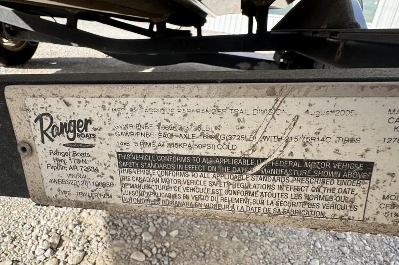 Slide: The Image of 2006 Ranger 519SVX Comanche trailer label with safety standards and specifications. - 11