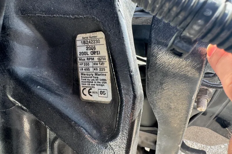 Slide: The Image of Label on 2006 Ranger 519SVX Comanche, detailing engine specifications and serial number. - 12