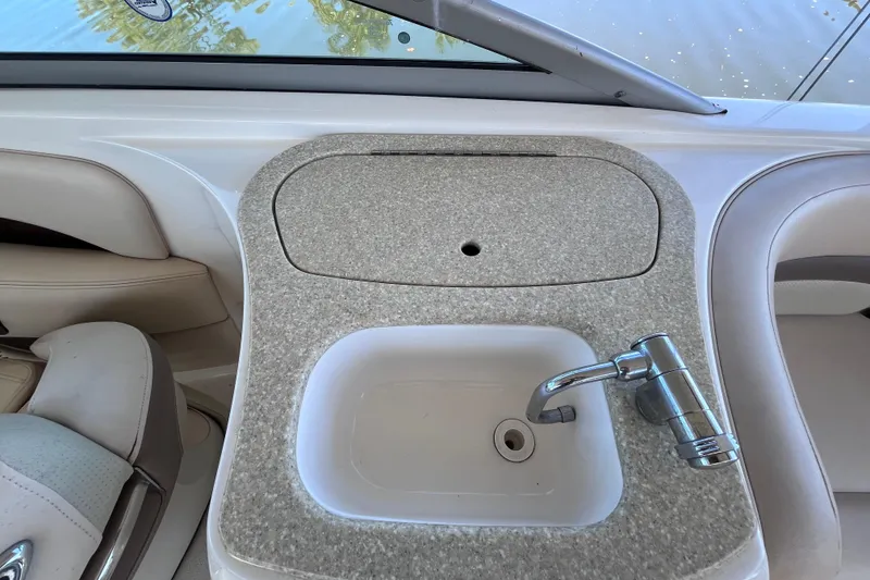 Slide: The Image of 2006 Chaparral 246 SSi boat interior with sink and faucet. - 26