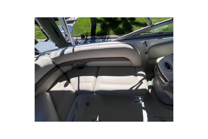 Slide: The Image of Interior seating of 2006 Chaparral 246 SSi boat with beige upholstery. - 30
