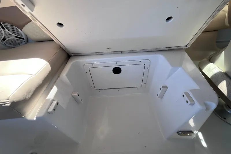 Slide: The Image of Open storage compartment in 2006 Chaparral 246 SSi boat interior. - 34