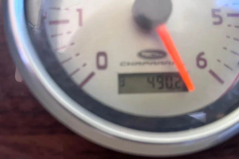 Slide: The Image of Close-up of a 2006 Chaparral 246 SSi boat tachometer showing 4902 hours. - 45