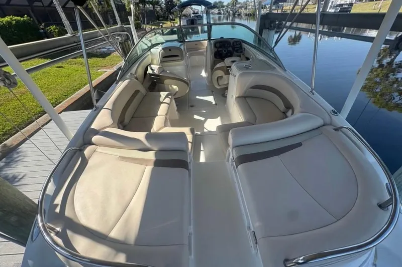 Slide: The Image of 2006 Chaparral 246 SSi boat interior with spacious seating and sleek design. - 5