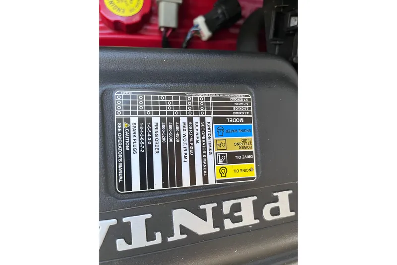 Slide: The Image of Engine specifications label on a 2006 Chaparral 246 SSi boat. - 53