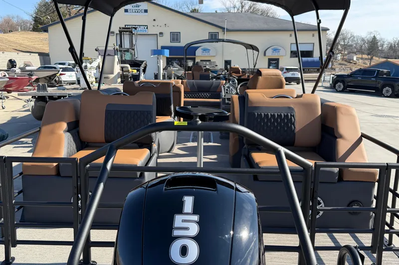 Slide: The Image of 2025 Sylvan L-3 SLZ pontoon boat with 150 HP engine, featuring luxurious seating. - 3