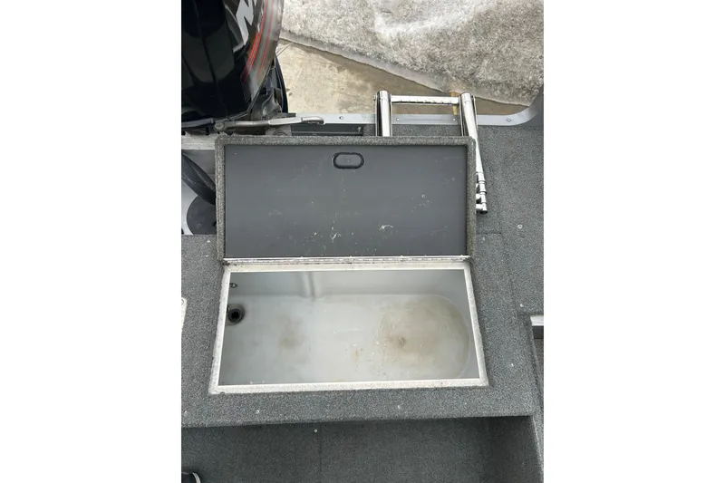 Slide: The Image of Open storage compartment on 2015 Lund 1775 Impact boat, showing interior space. - 18