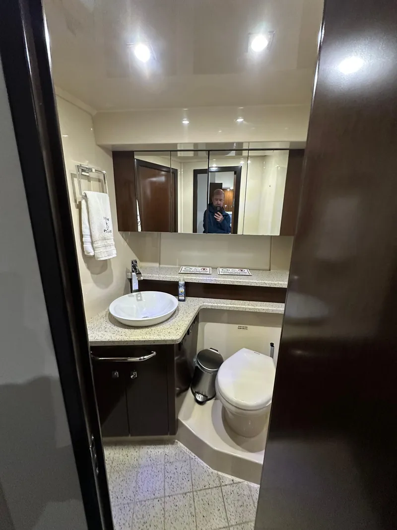 Slide: The Image of Bathroom interior of 2012 Cruisers Yachts 48 Cantius with modern fixtures and lighting. - 10