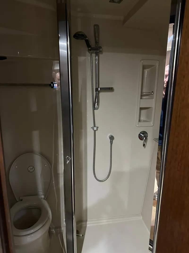 Slide: The Image of Bathroom interior of 2012 Cruisers Yachts 48 Cantius with shower and toilet. - 15