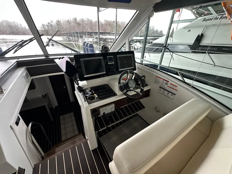 Slide: The Image of Helm of 2012 Cruisers Yachts 48 Cantius with modern navigation equipment. - 18