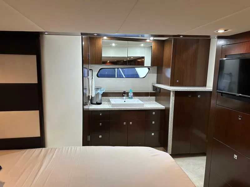 Slide: The Image of Luxurious interior of 2012 Cruisers Yachts 48 Cantius with modern cabinetry and sleek design. - 20