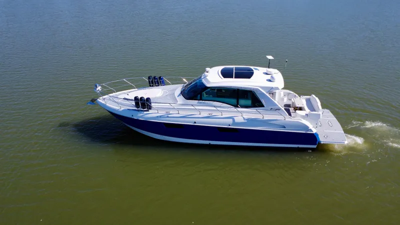 Slide: The Image of 2012 Cruisers Yachts 48 Cantius cruising on calm water. - 5