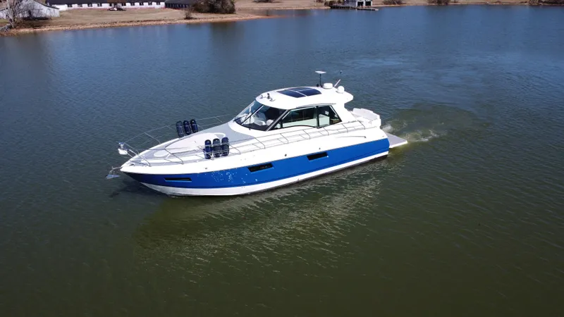 Slide: The Image of 2012 Cruisers Yachts 48 Cantius cruising on a calm lake. - 6