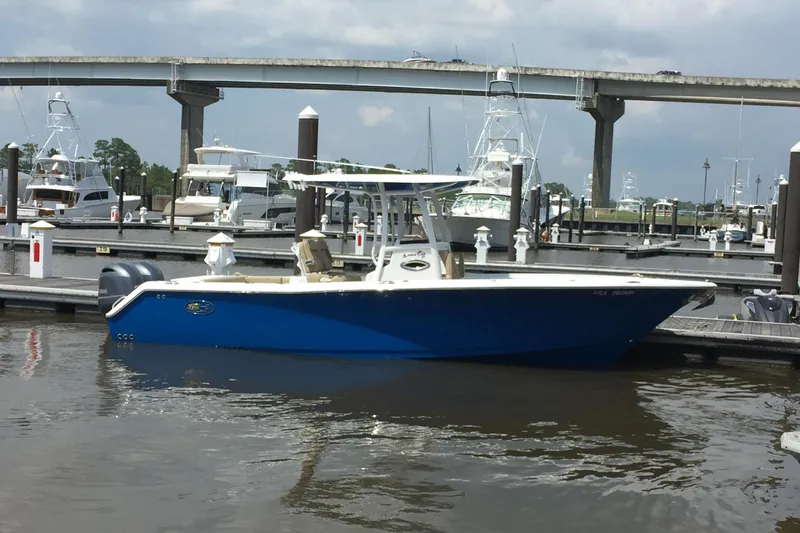 The Image of 2016 Sea Hunt Gamefish 27 boat docked at marina. - 0
