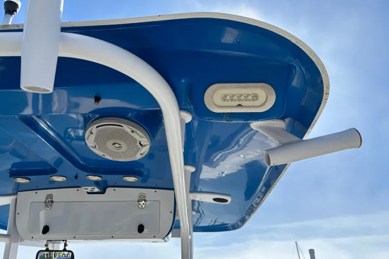Slide: The Image of 2016 Sea Hunt Gamefish 27 boat canopy with speakers and rod holders. - 28
