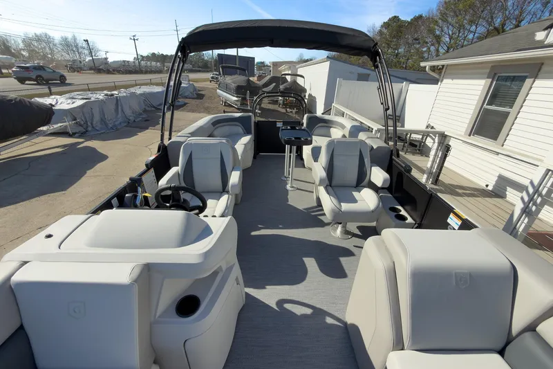 Slide: The Image of 2026 Godfrey Sweetwater 22' Split Bench Tritoon with spacious seating and modern design. - 35
