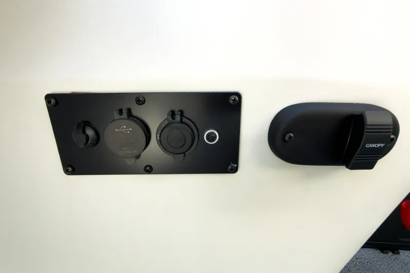 Slide: The Image of 2026 Godfrey Sweetwater 22' Tritoon USB and canopy control panel. - 41