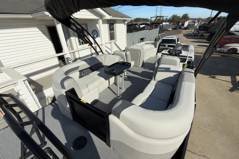Slide: The Image of 2026 Godfrey Sweetwater 22' Split Bench Tritoon with spacious seating and modern design. - 52