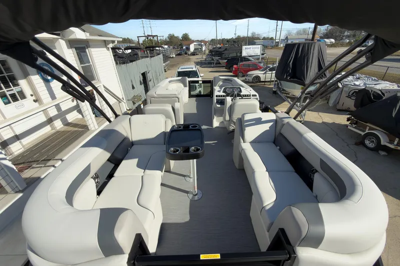 Slide: The Image of 2026 Godfrey Sweetwater 22' Split Bench Tritoon with spacious seating and modern design. - 53