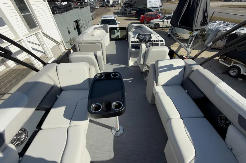 Slide: The Image of 2026 Godfrey Sweetwater 22' Tritoon with spacious seating and modern interior design. - 54