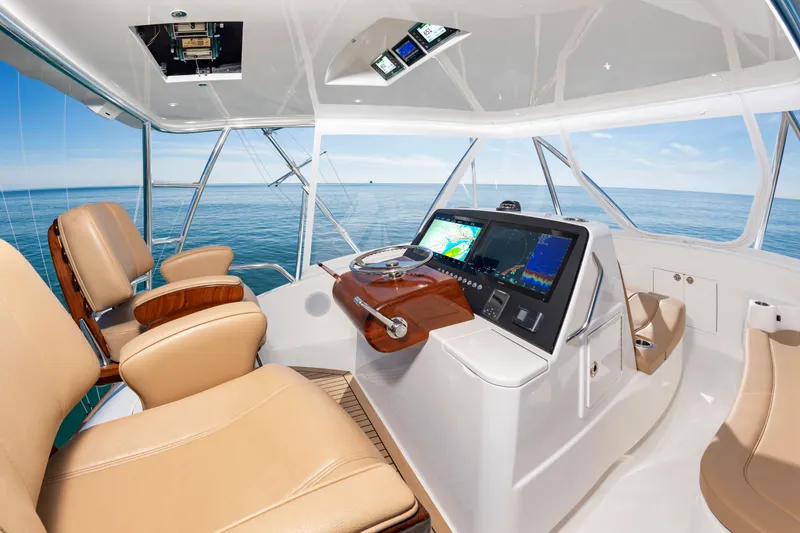 Slide: The Image of Interior of 2024 Albemarle Spencer Edition with modern helm console. - 14