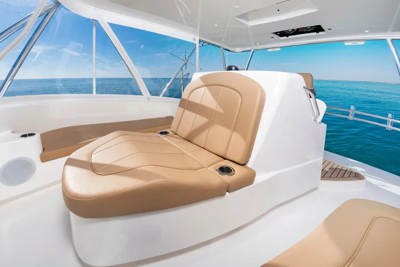 Slide: The Image of Luxurious seating area on the 2024 Albemarle Spencer Edition yacht. - 18