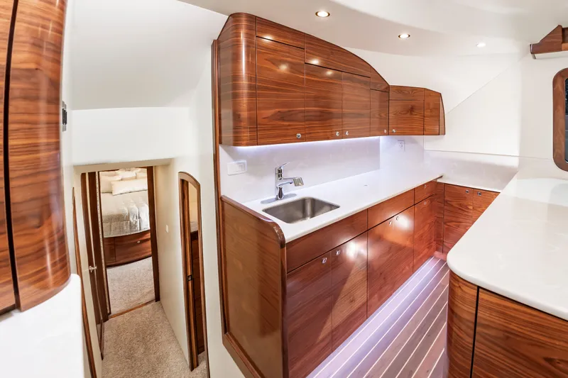 Slide: The Image of Luxurious kitchen in the 2024 Albemarle Spencer Edition yacht. - 22