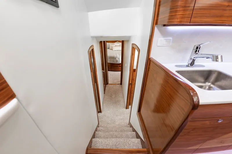 Slide: The Image of Interior of 2024 Albemarle Spencer Edition with stairs and kitchen. - 27