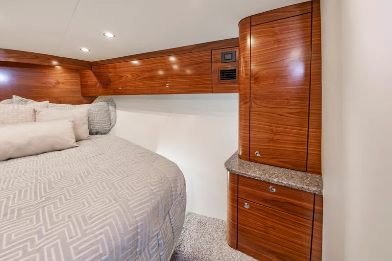 Slide: The Image of Luxurious bedroom in the 2024 Albemarle Spencer Edition boat. - 30