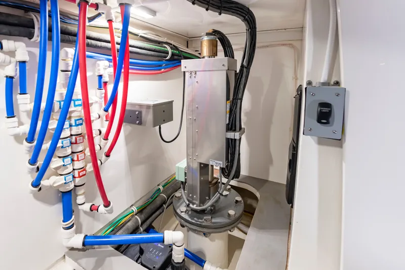 Slide: The Image of Albemarle Spencer Edition 2024 technical room with cables and pipes. - 37